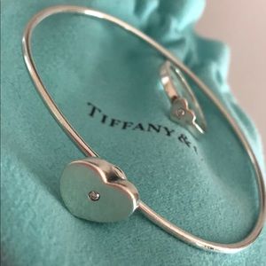 Tiffany&co dainty diamond heart set! 
Two piece set, ring and clasping bracelet.